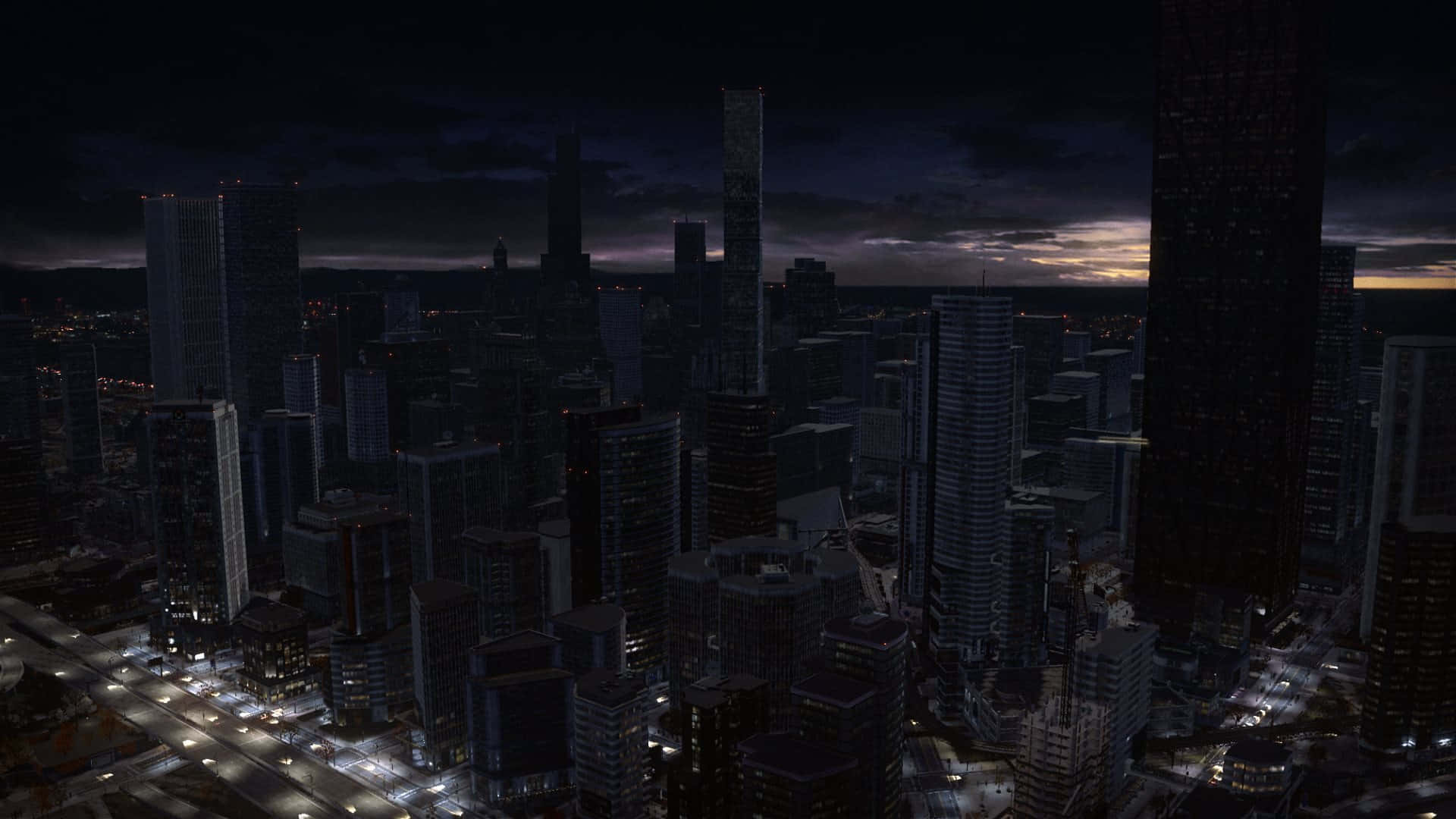 A City At Night With Tall Buildings Background