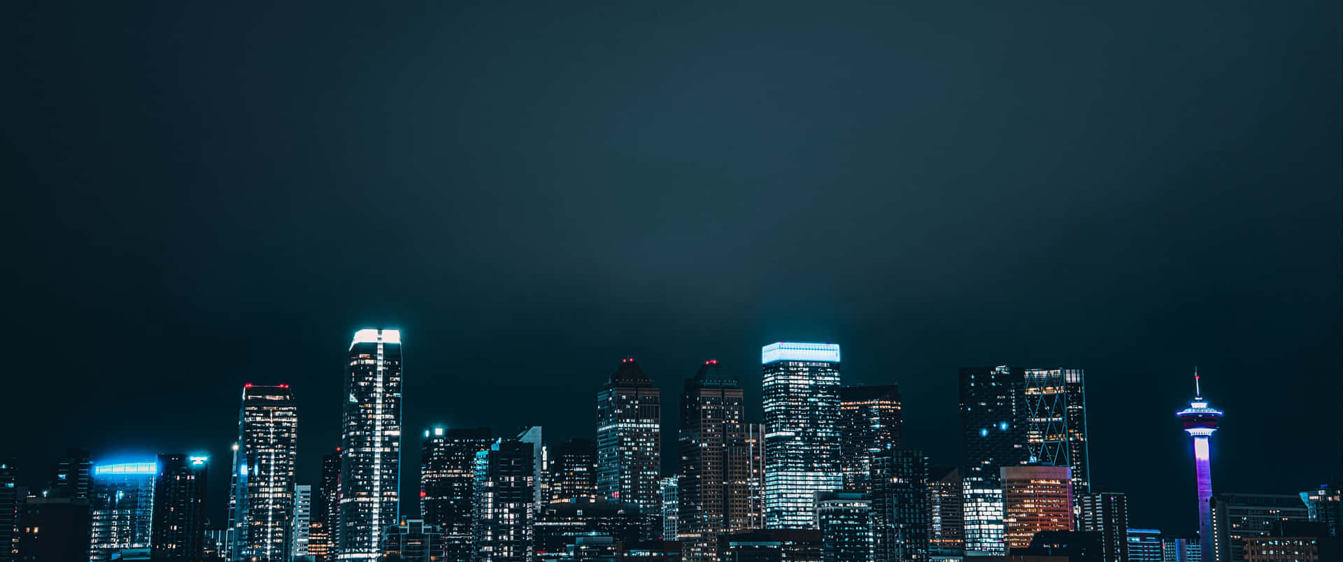 A City Skyline At Night Background