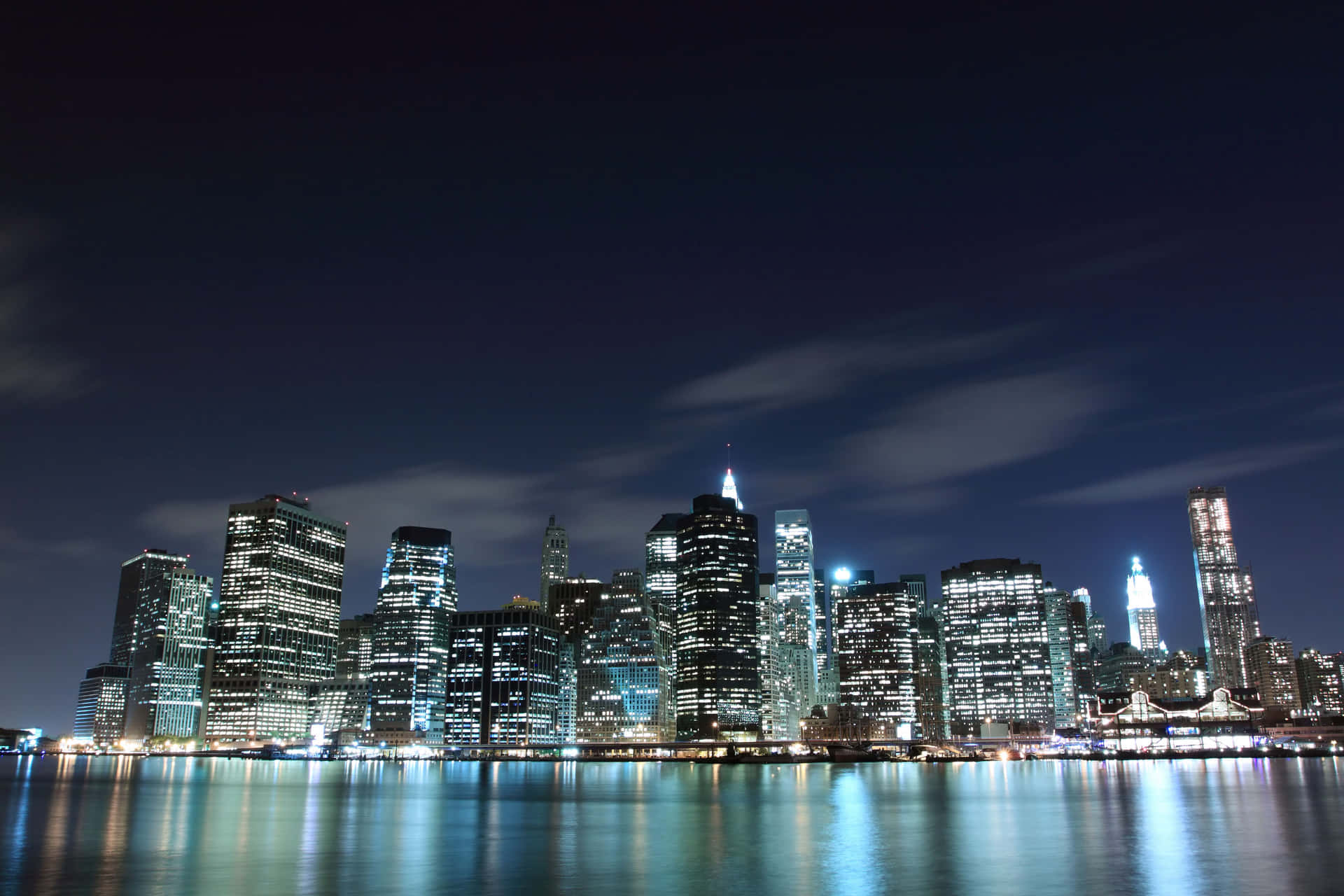 A City Skyline At Night Background