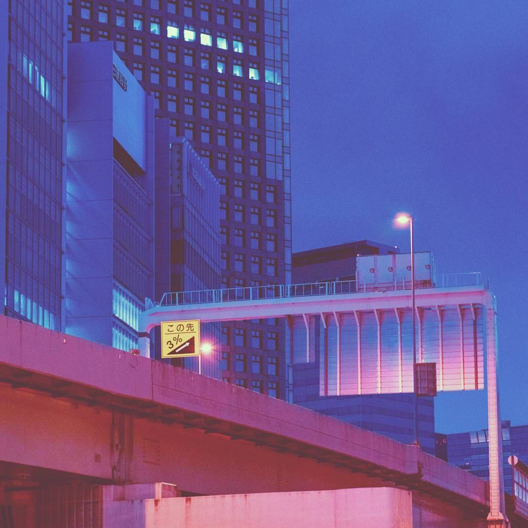 A City Street With A Bridge Background