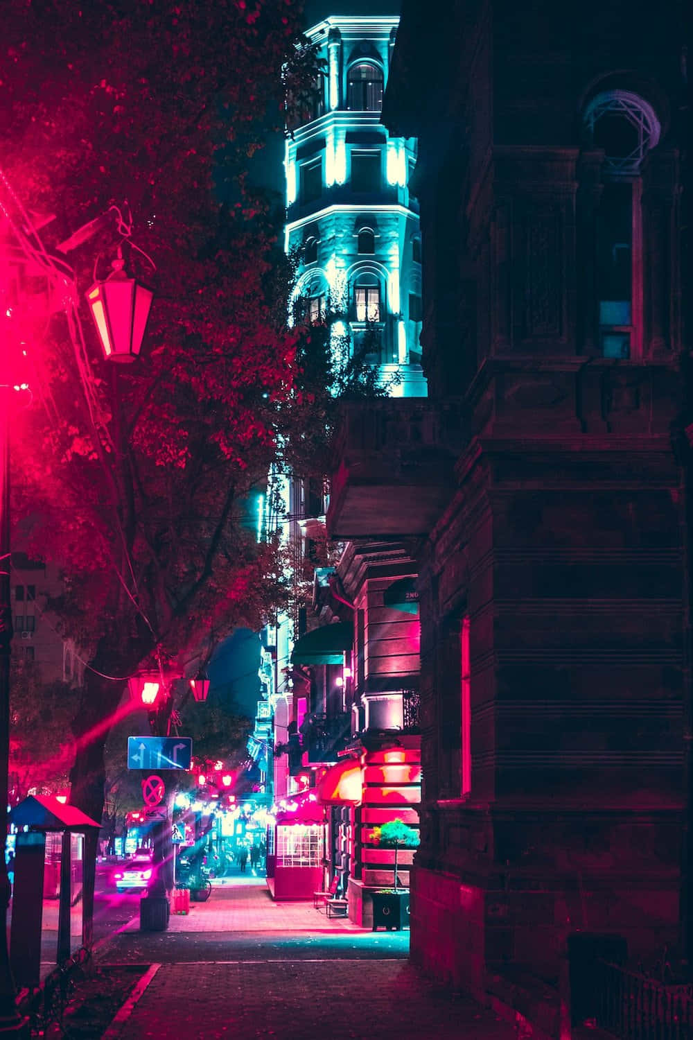 A City Street With A Clock Tower Background
