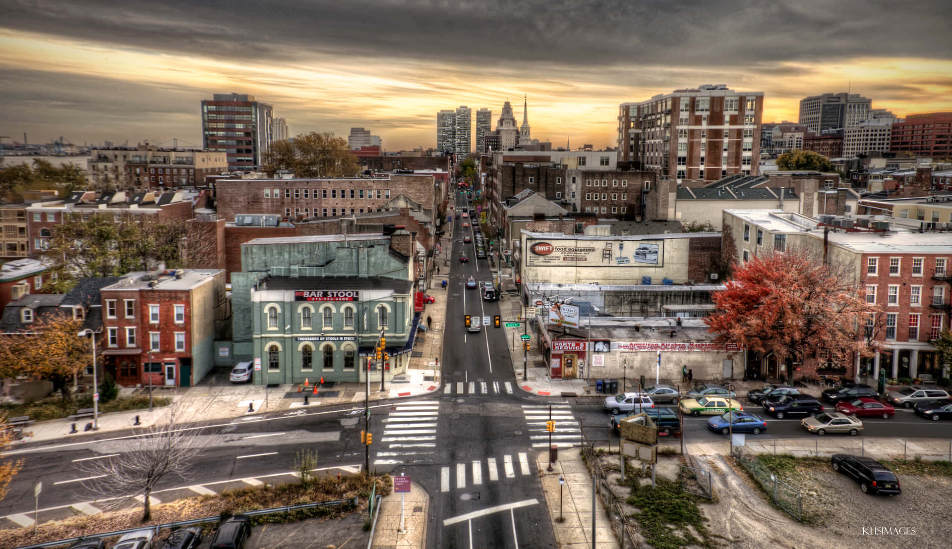 A City Street With Cars And Buildings Background