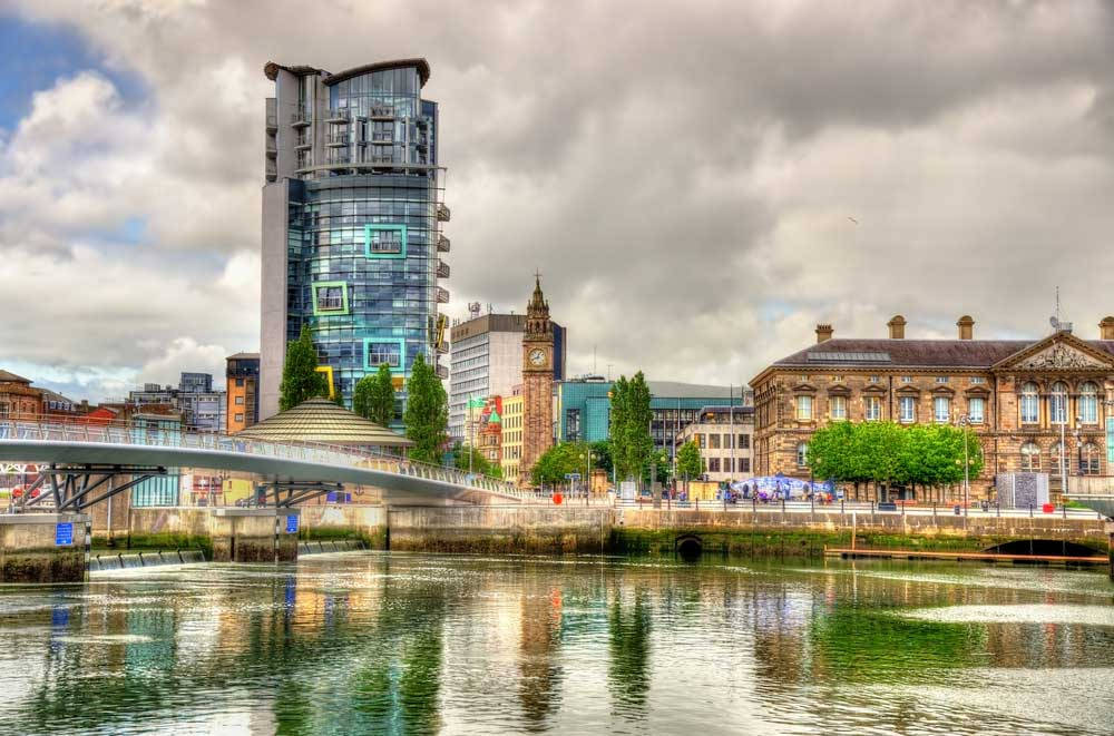 A City With A Bridge And Buildings In The Background