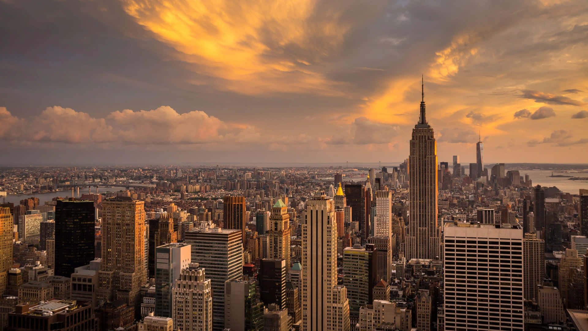 A Cityscape With A Sunset