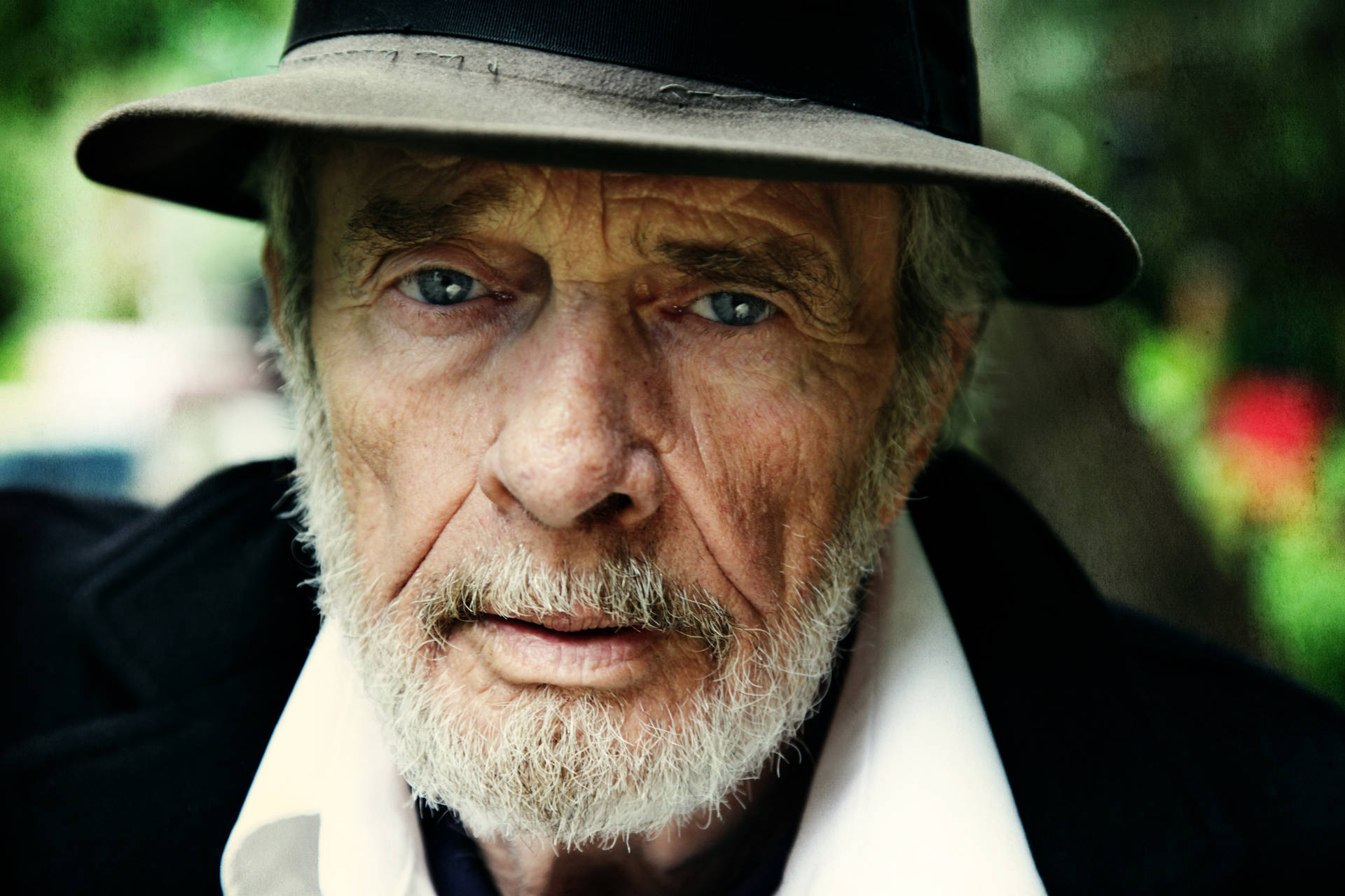 A Classic Black And White Portrait Of The Legendary Country Music Artist, Merle Haggard.