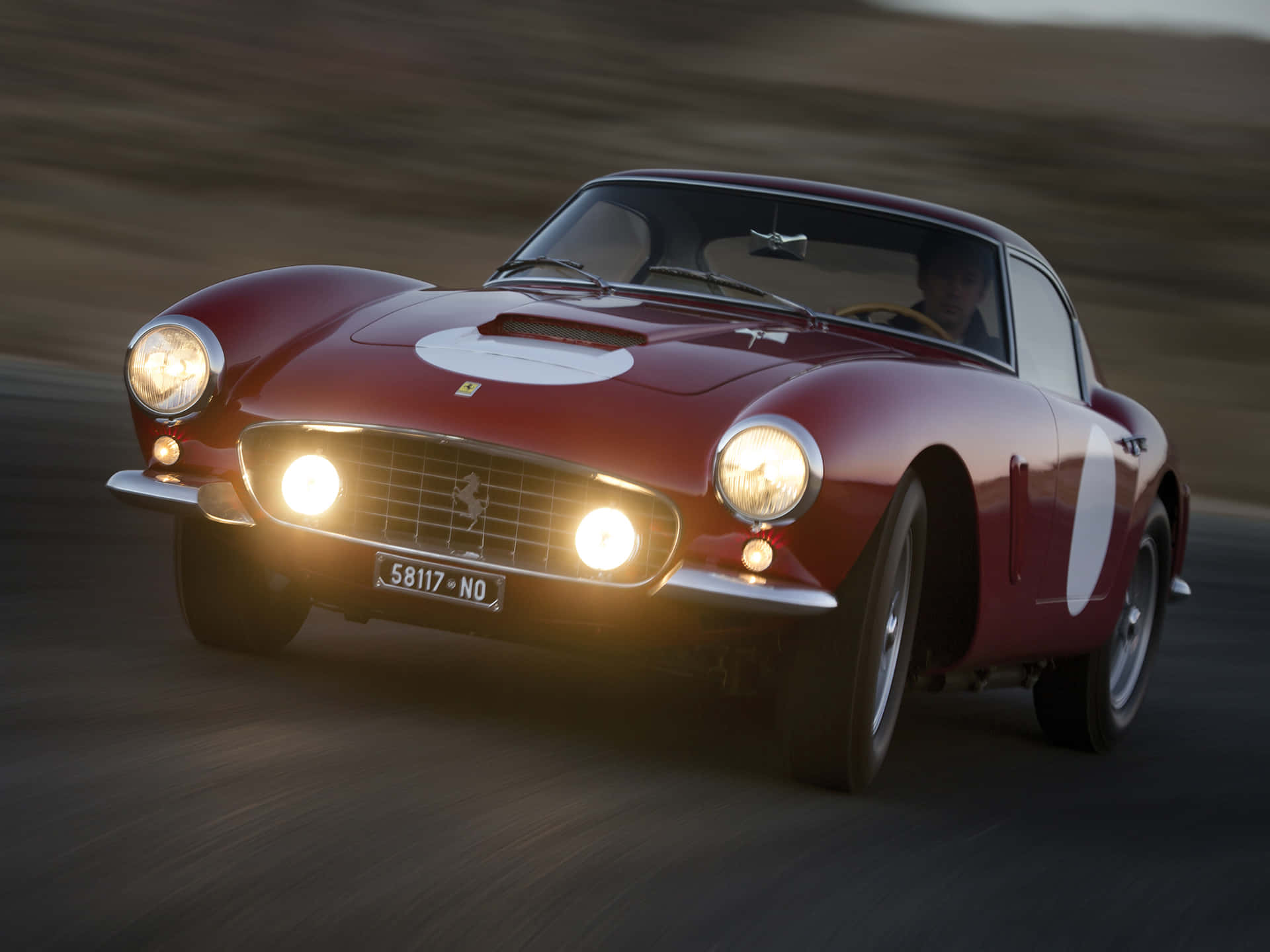 A Classic Ferrari From Another Era Background