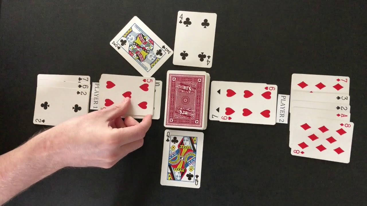 A Classic Game Of Bezique With 5 Heart Card