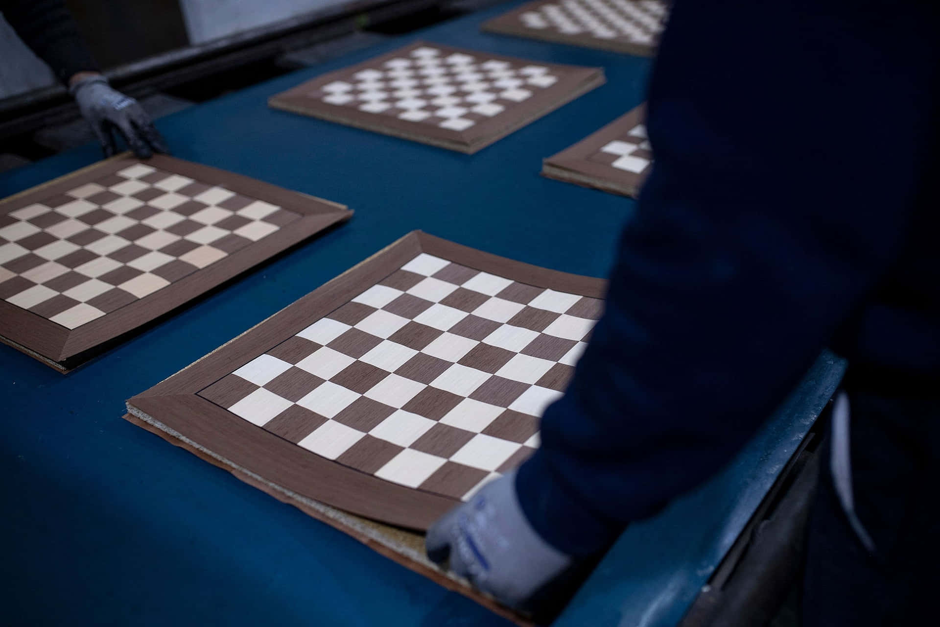 A Classic Game Of Chess On A Brown Chessboard Background