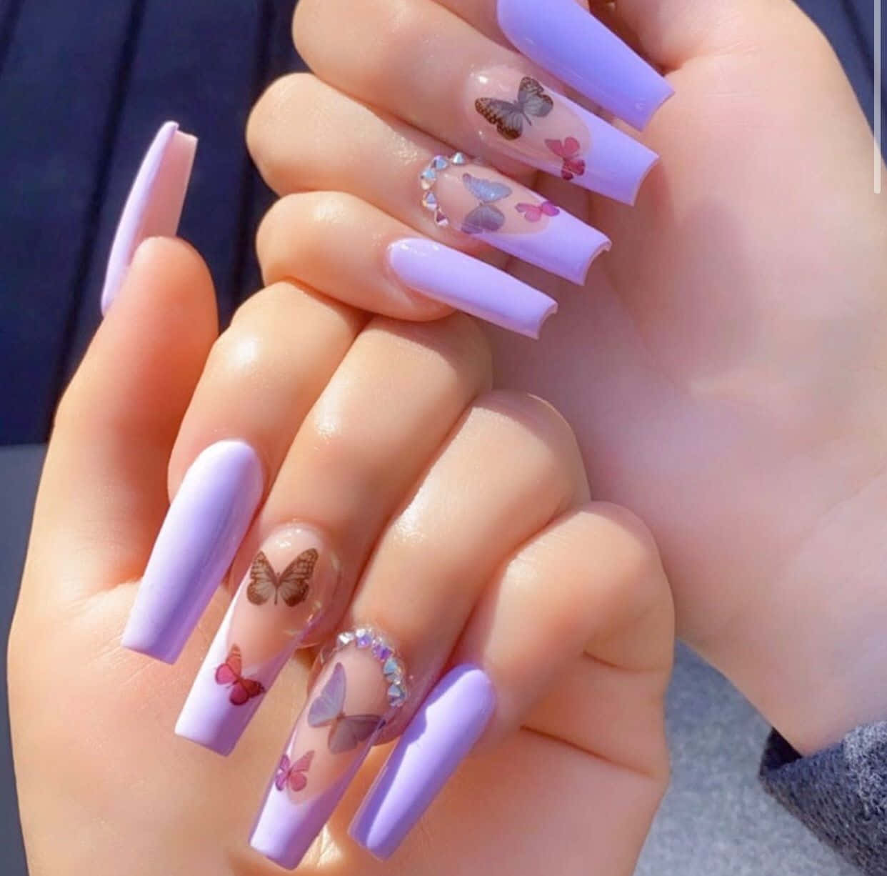A Close Up Look At Beautiful, Stylish Acrylic Nails Background