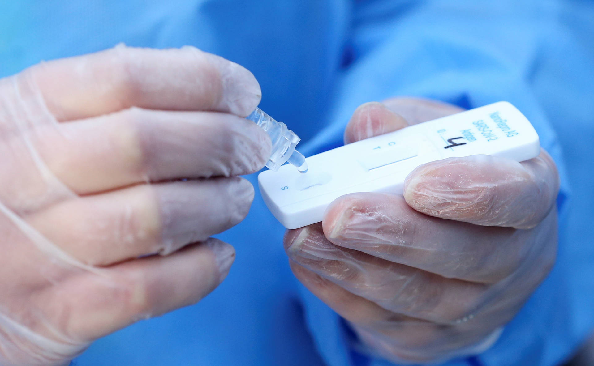 A Close-up Look Of A Covid-19 Test Kit Background