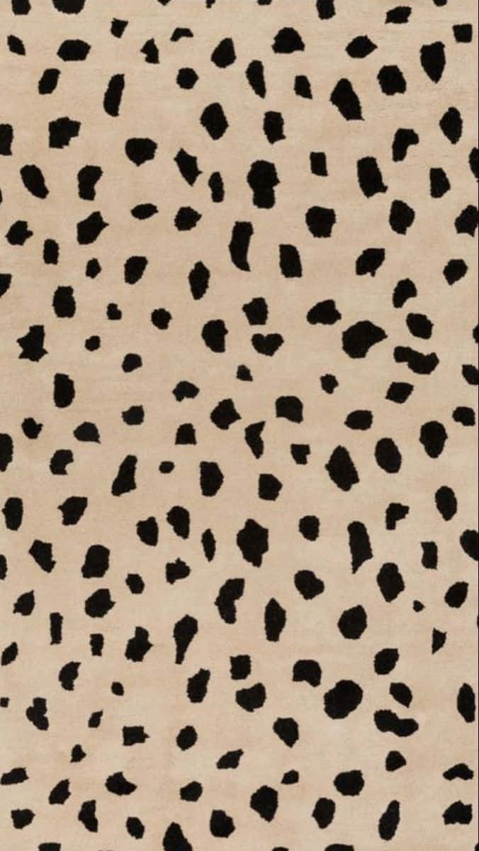 A Close-up Look Of Black Dots Background
