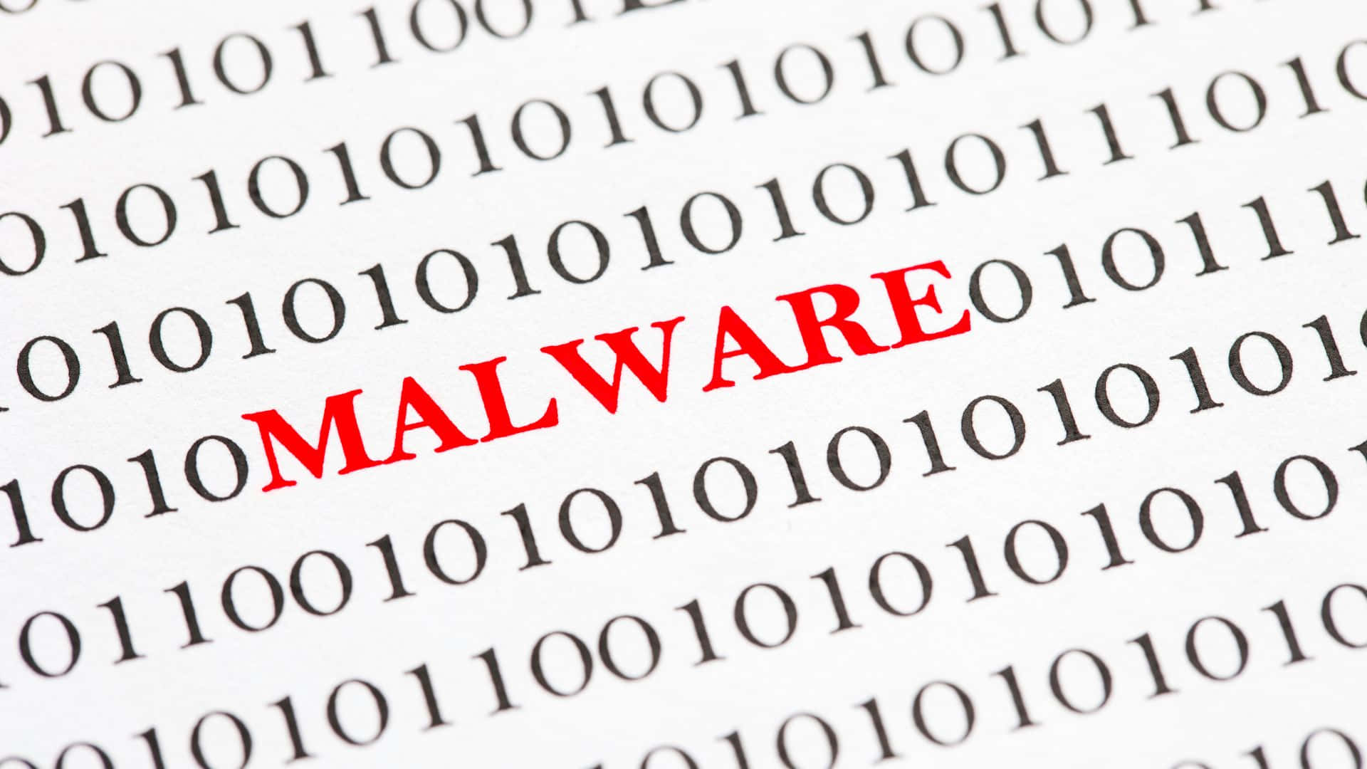 A Close Up Of A Binary Code With The Word Malware Background