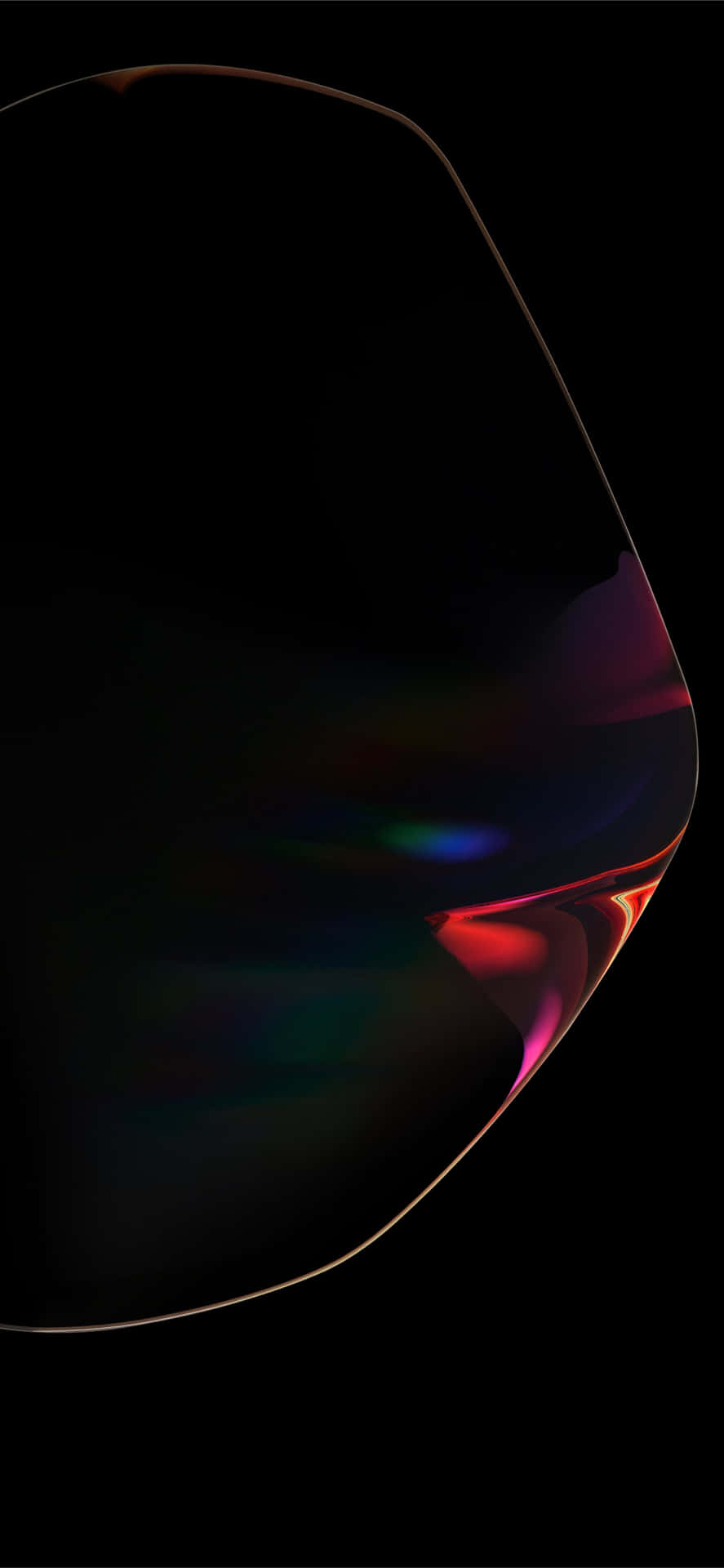 A Close Up Of A Black Object With A Rainbow Colored Light Background