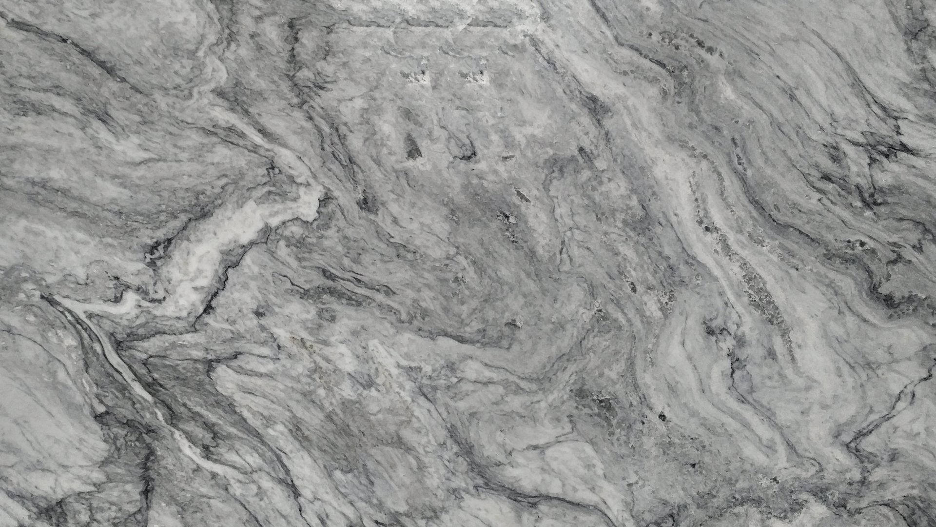 A Close Up Of A Gray Marble Background