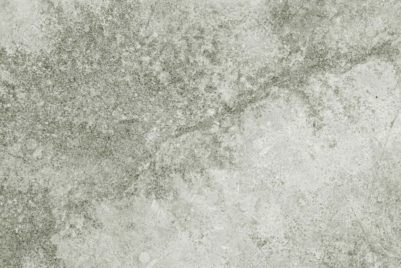 A Close Up Of A Gray Tile With White And Gray
