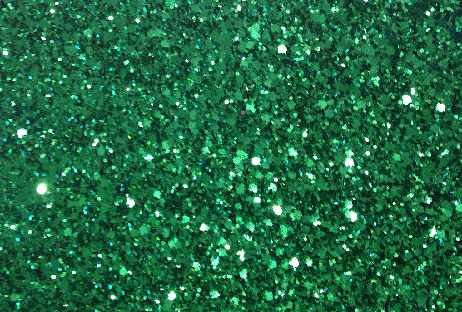 A Close Up Of A Green Glitter