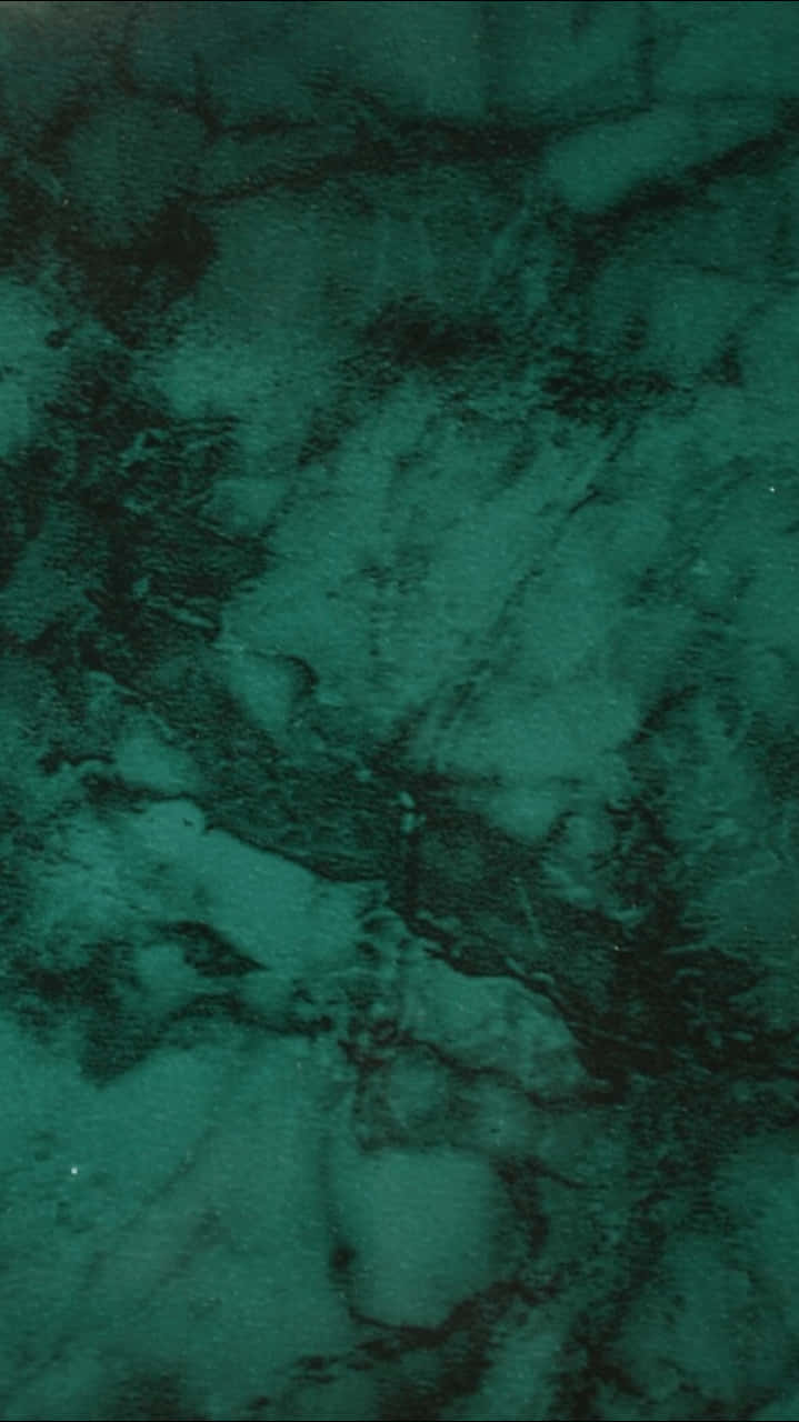 A Close Up Of A Green Marble Surface Background