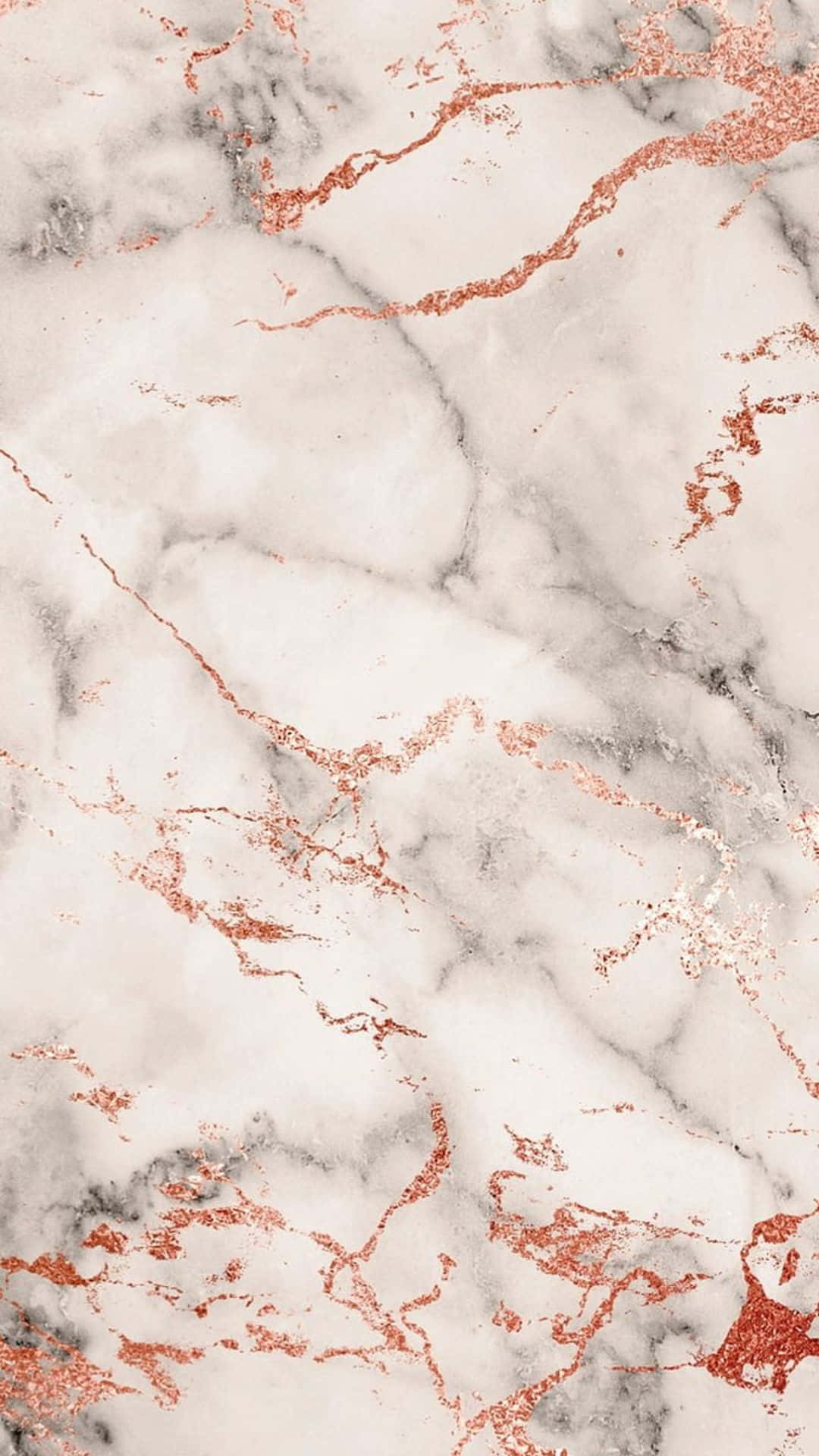 A Close Up Of A Marble With Rose Gold Paint