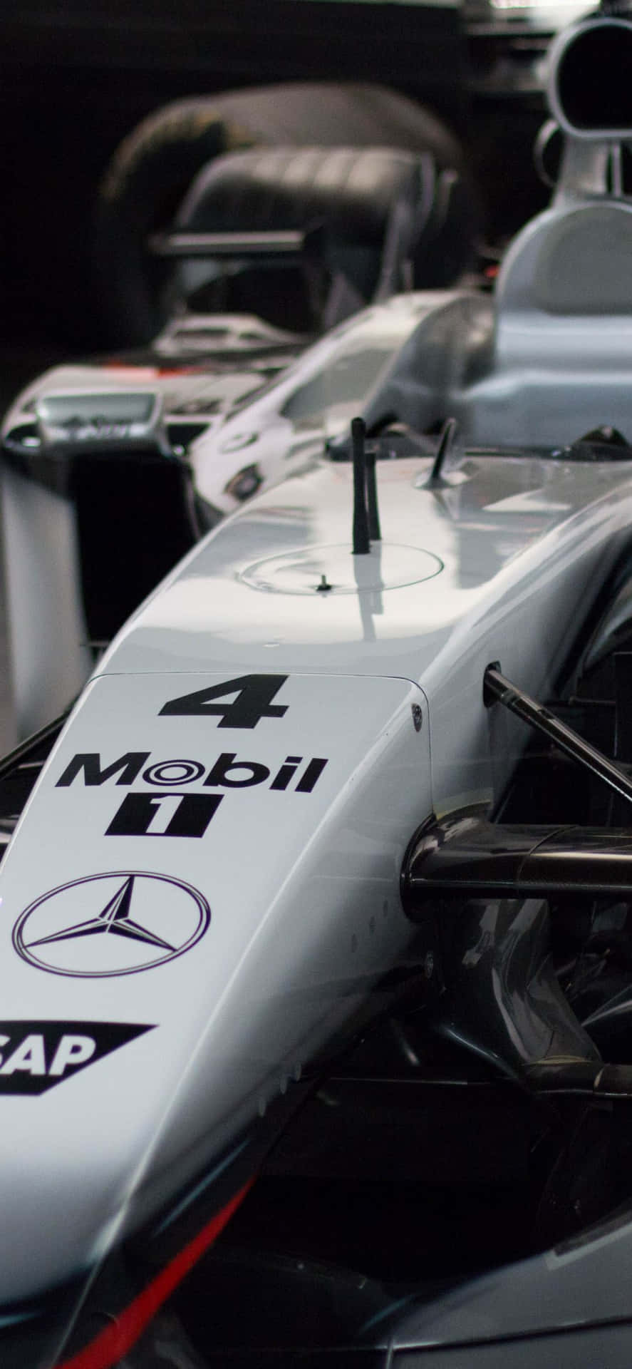 A Close Up Of A Mercedes F1 Car Background