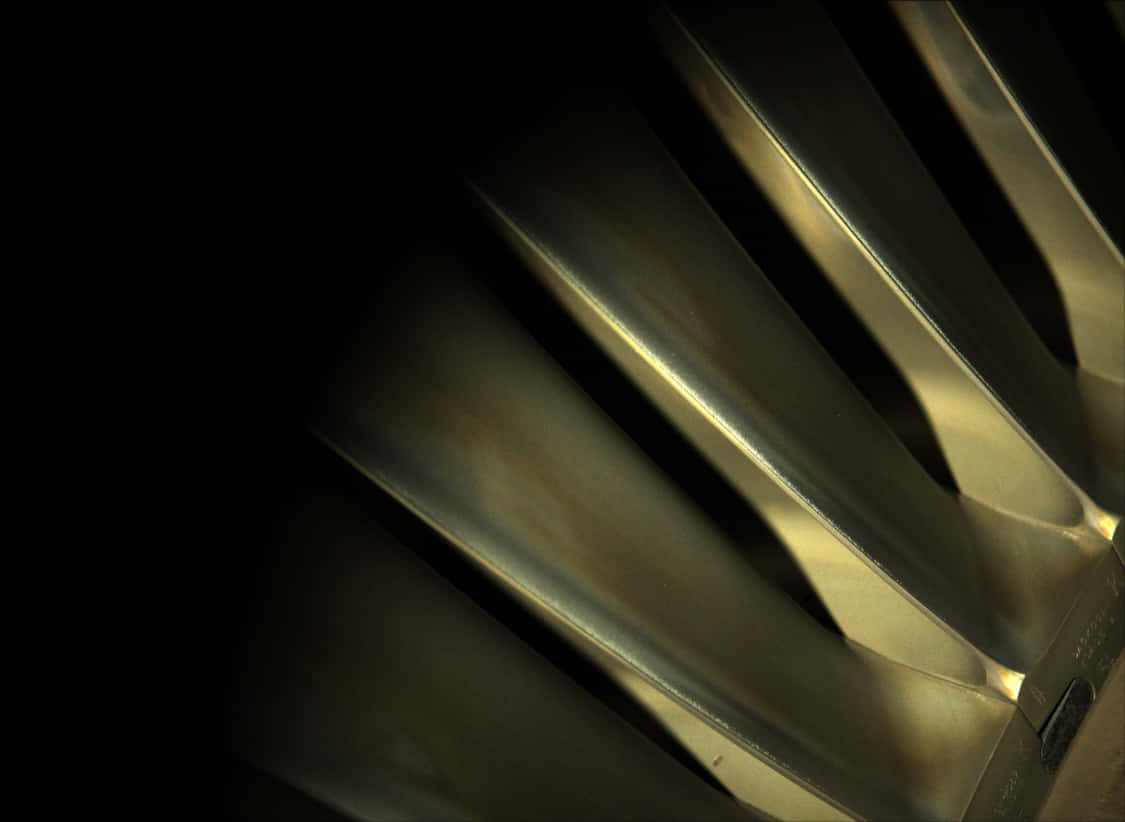 A Close Up Of A Metal Fan Background