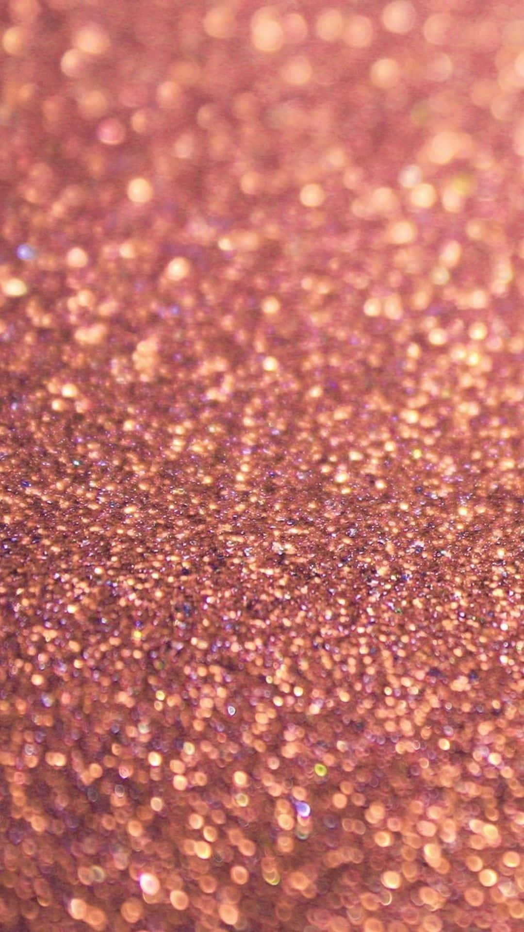 A Close Up Of A Pink Glitter Background