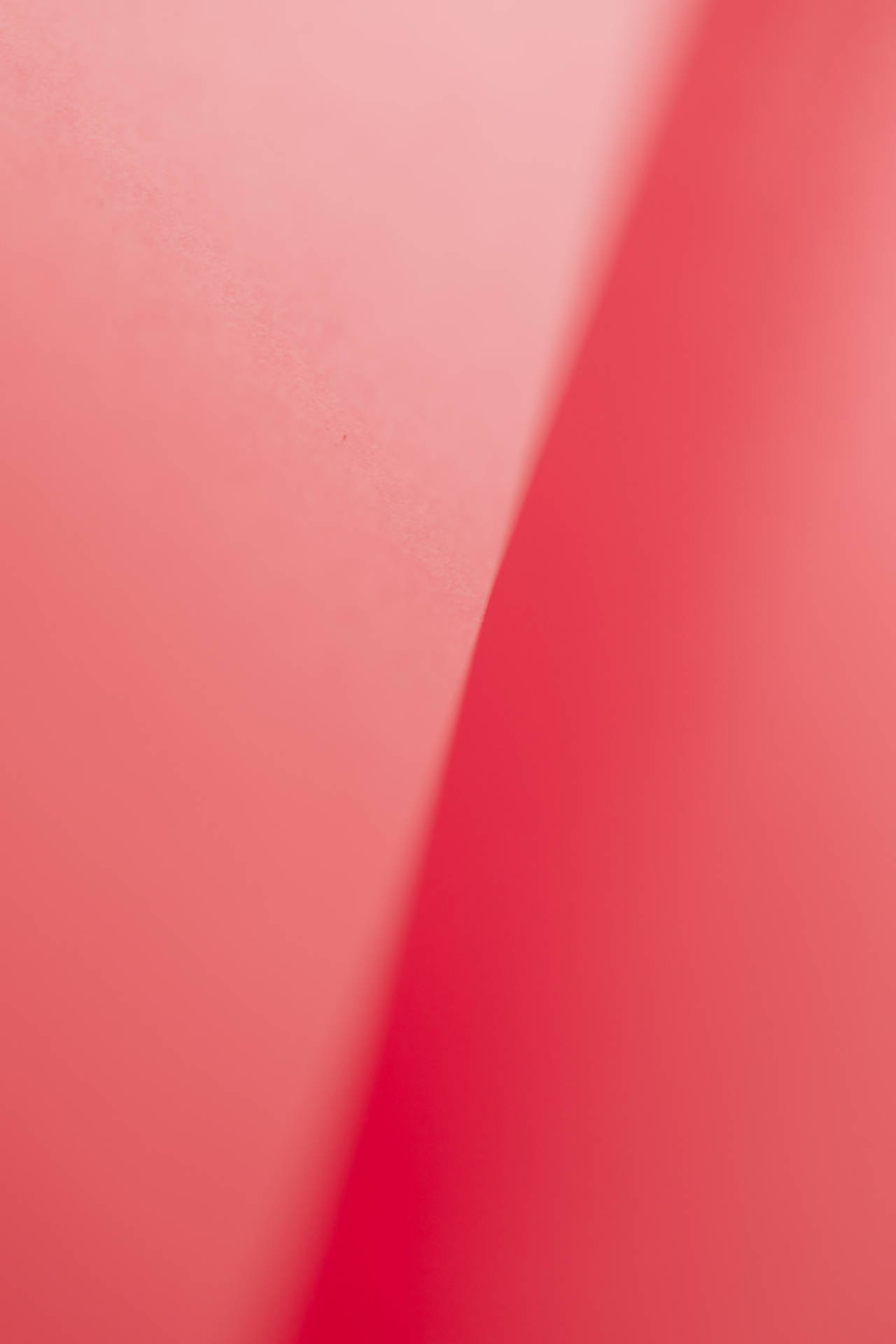 A Close Up Of A Pink Paper Background