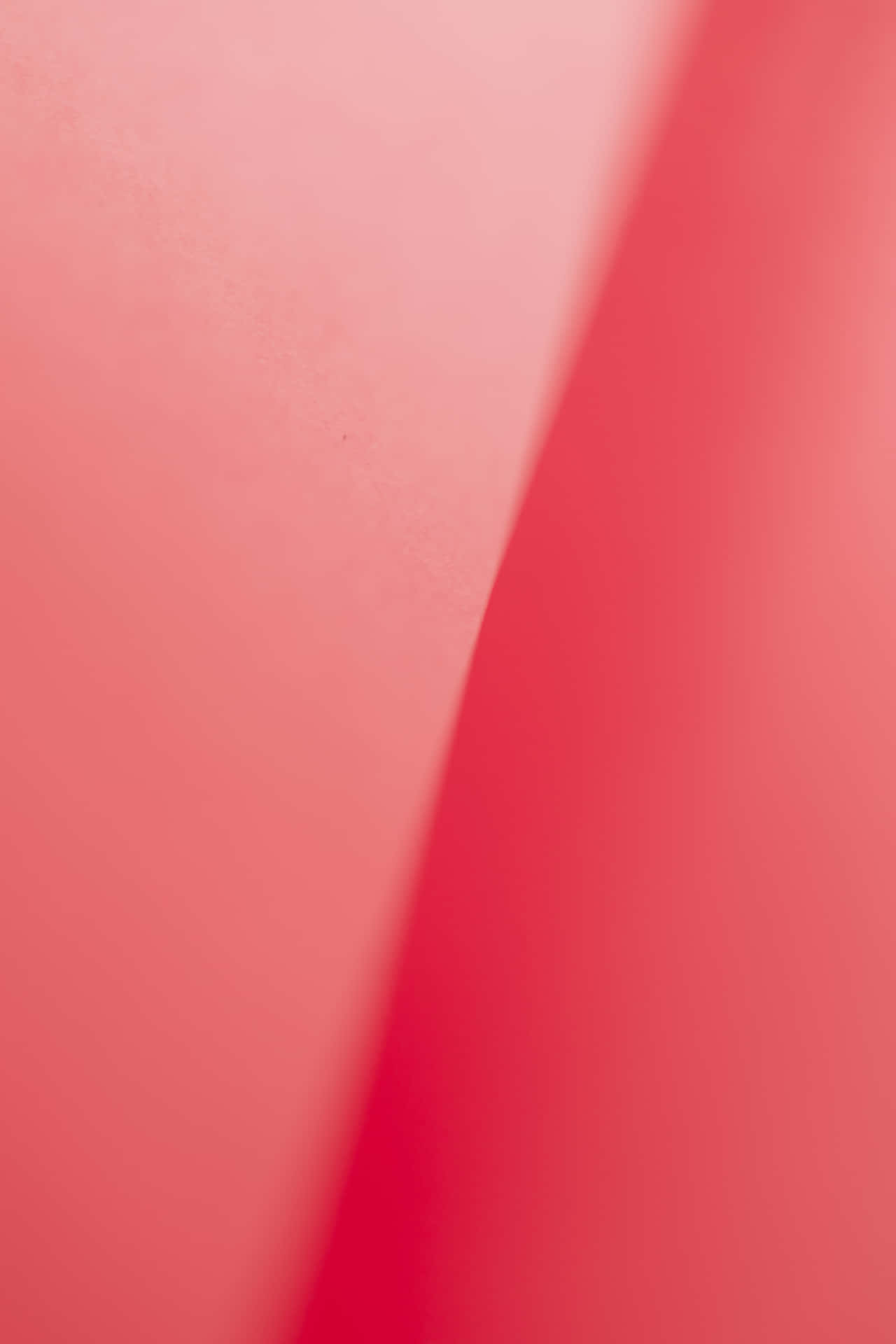 A Close Up Of A Pink Paper Background