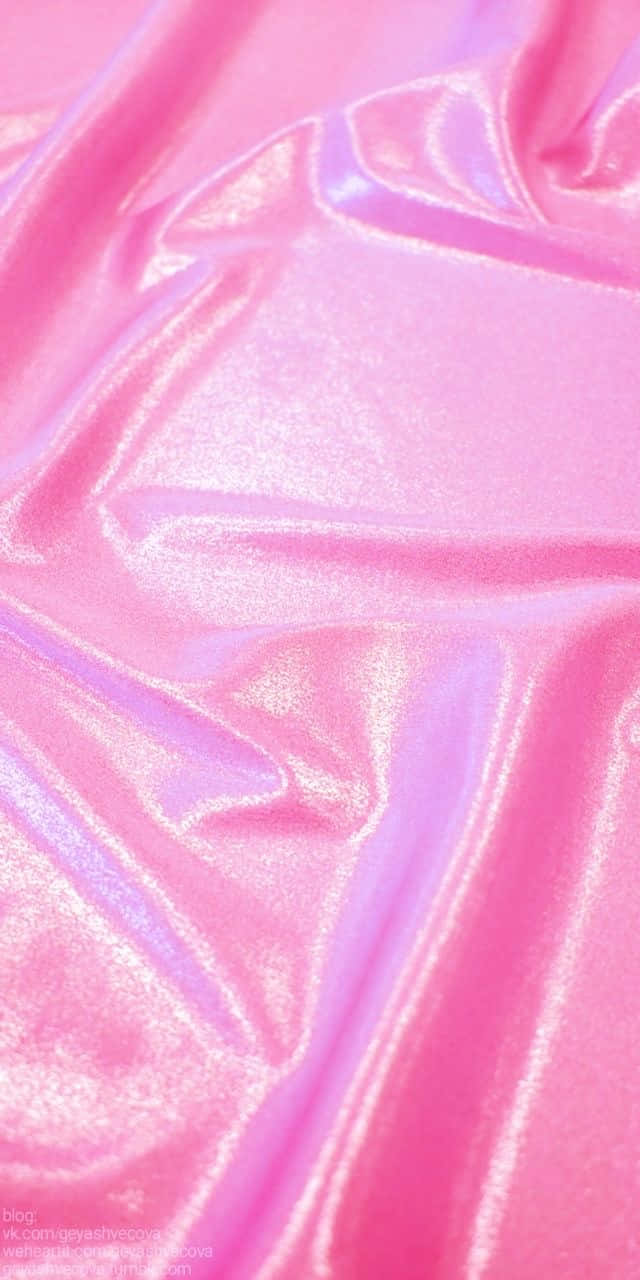 A Close Up Of A Pink Shiny Fabric Background