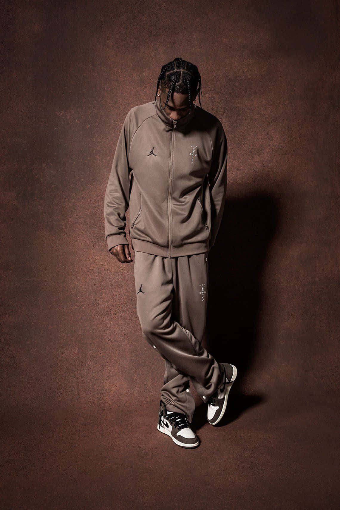 A Close-up Of A Stylish Travis Scott Jordan 1 Sneaker Background