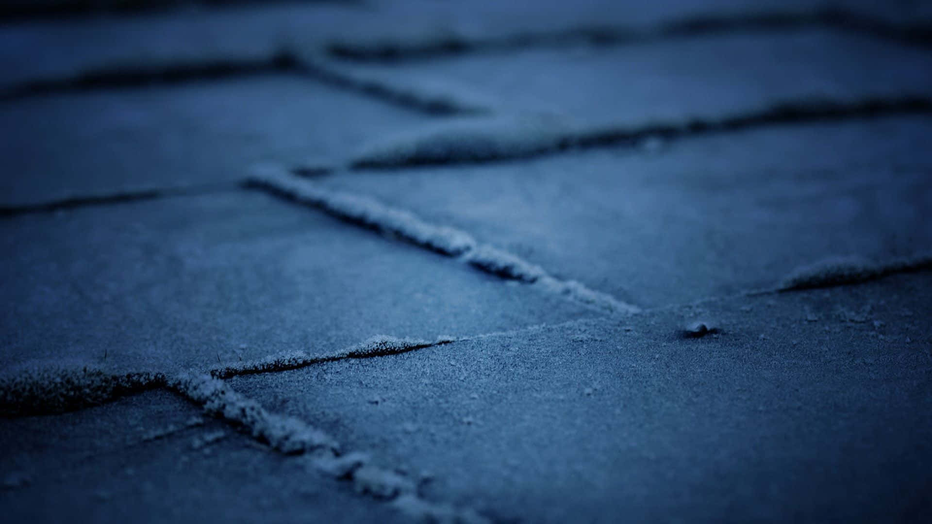 A Close Up Of A Tiled Floor At Night Background