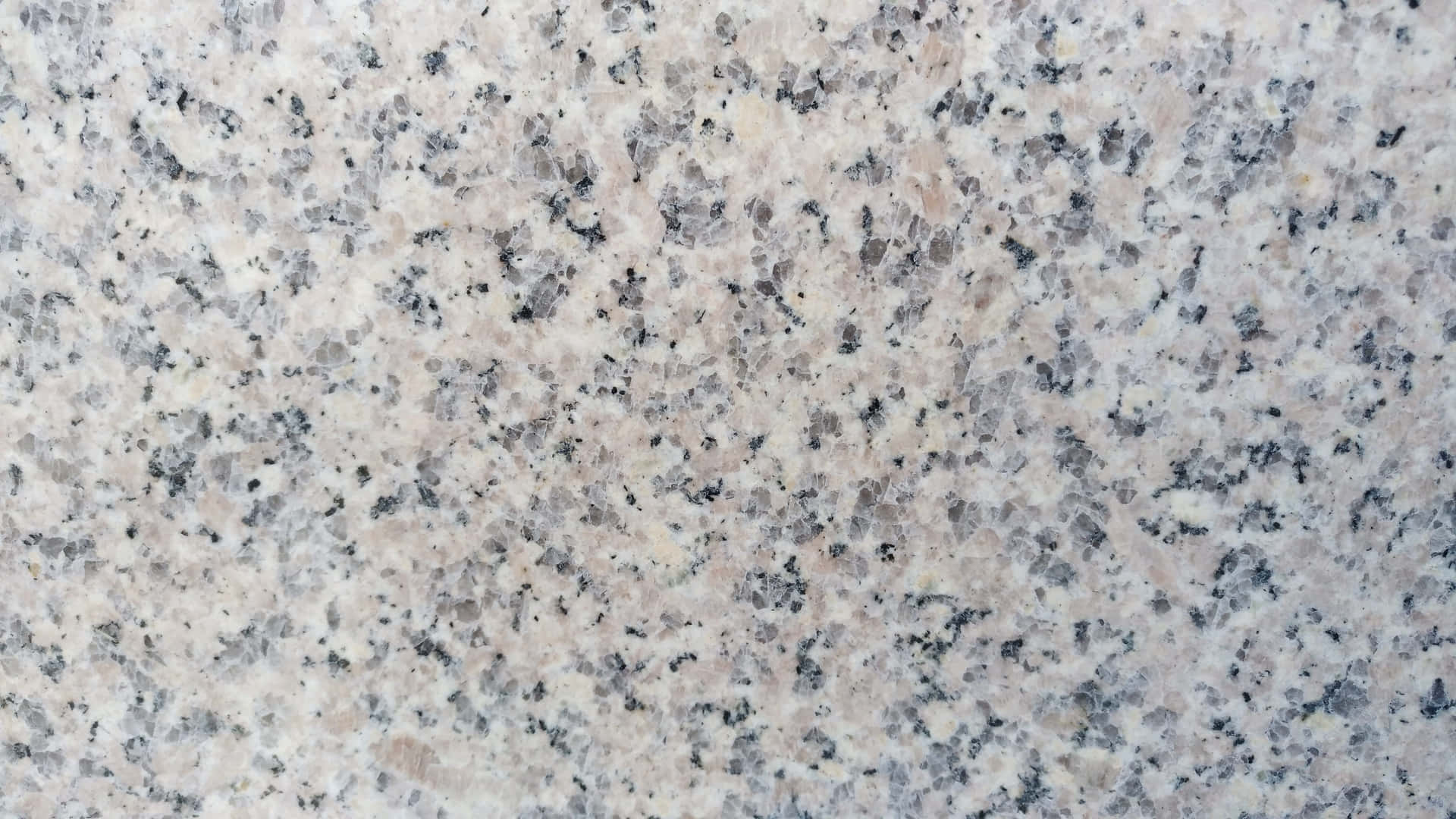 A Close Up Of A White Granite Surface Background