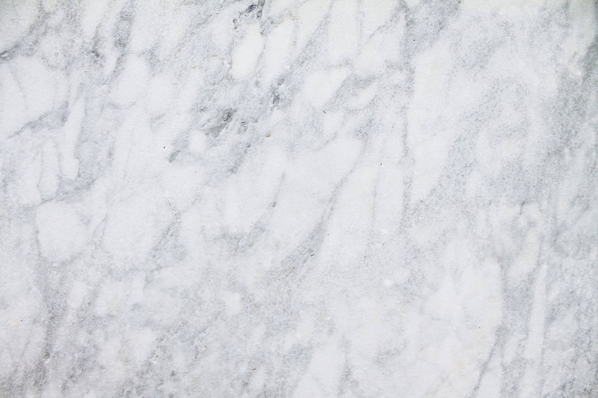 A Close Up Of A White Marble Background