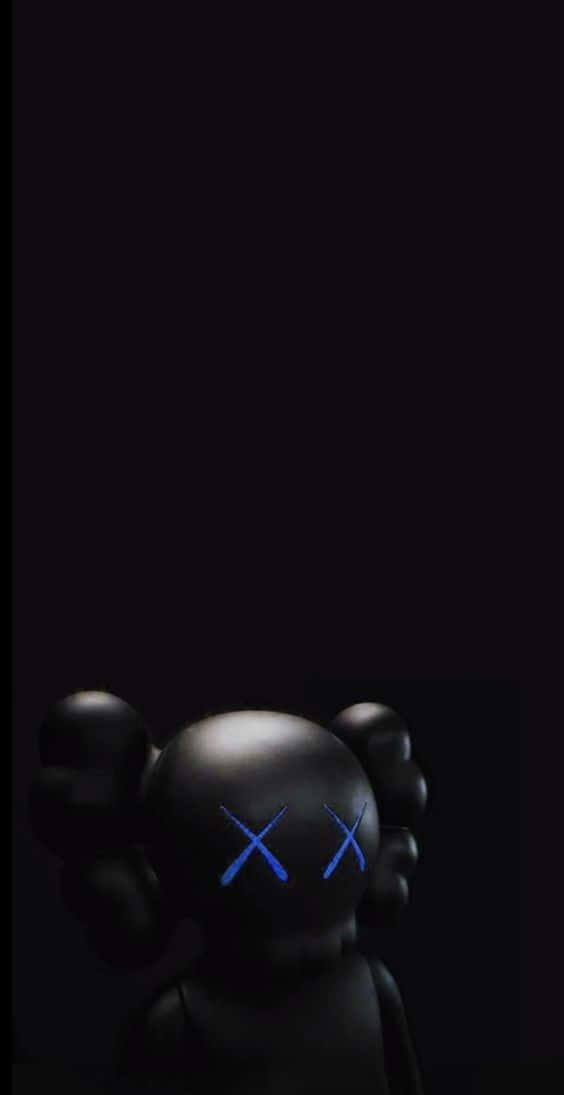 A Close-up Of Kaws' Iconic Black And White Designs Background