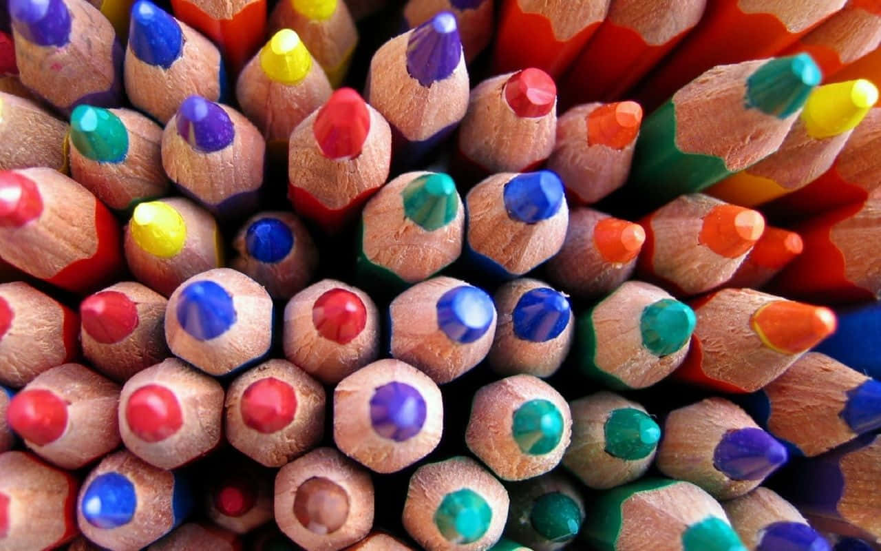 A Close Up Of Many Colored Pencils Background