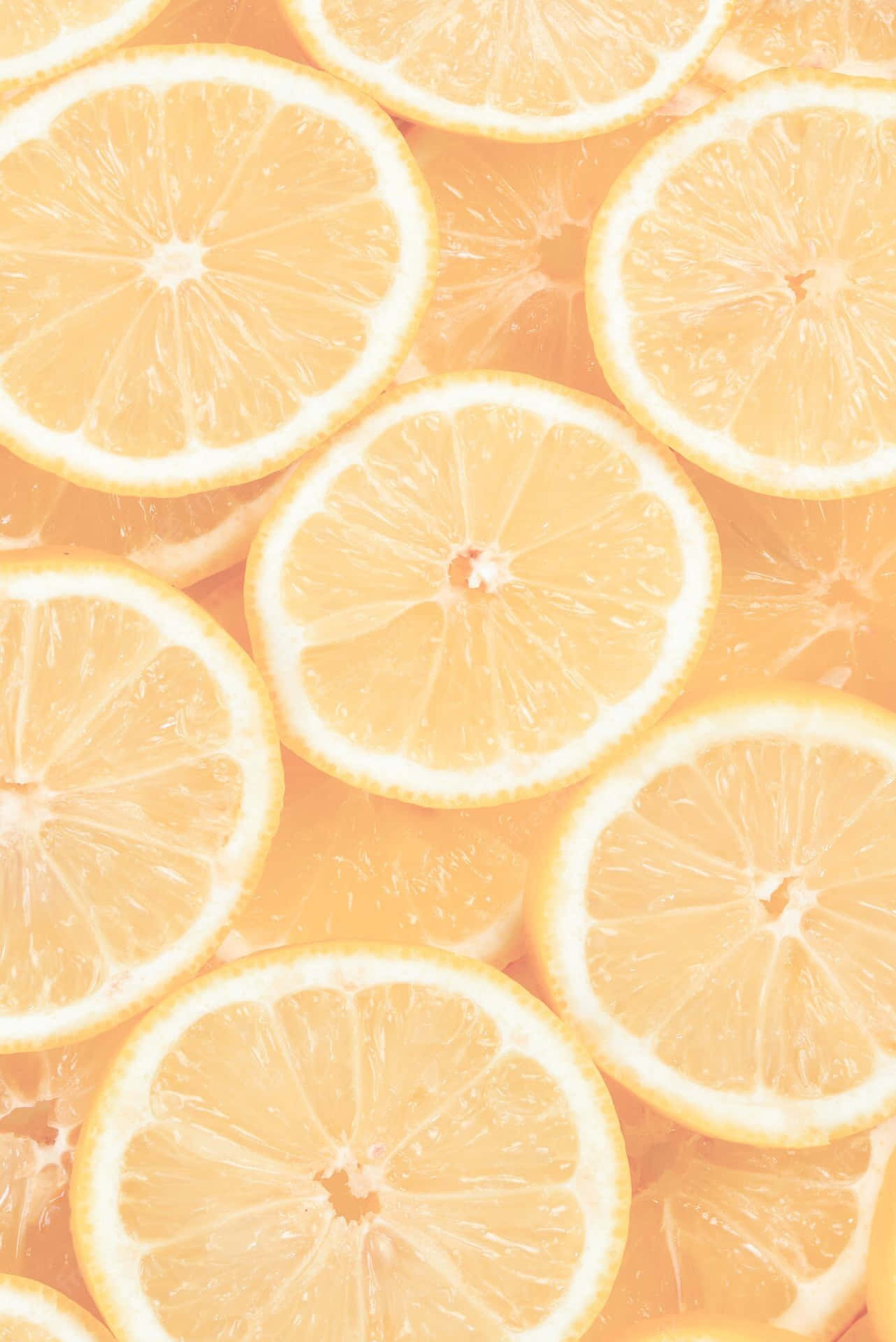 A Close Up Of Sliced Lemons Background