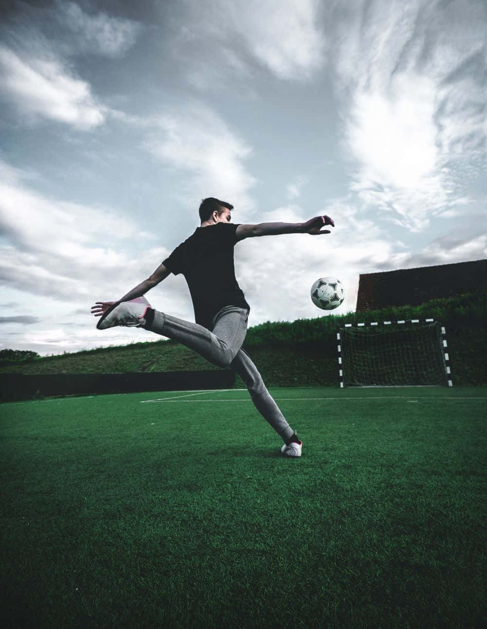 A Close-up Shot Of A Classic Black And White Soccer Ball Background