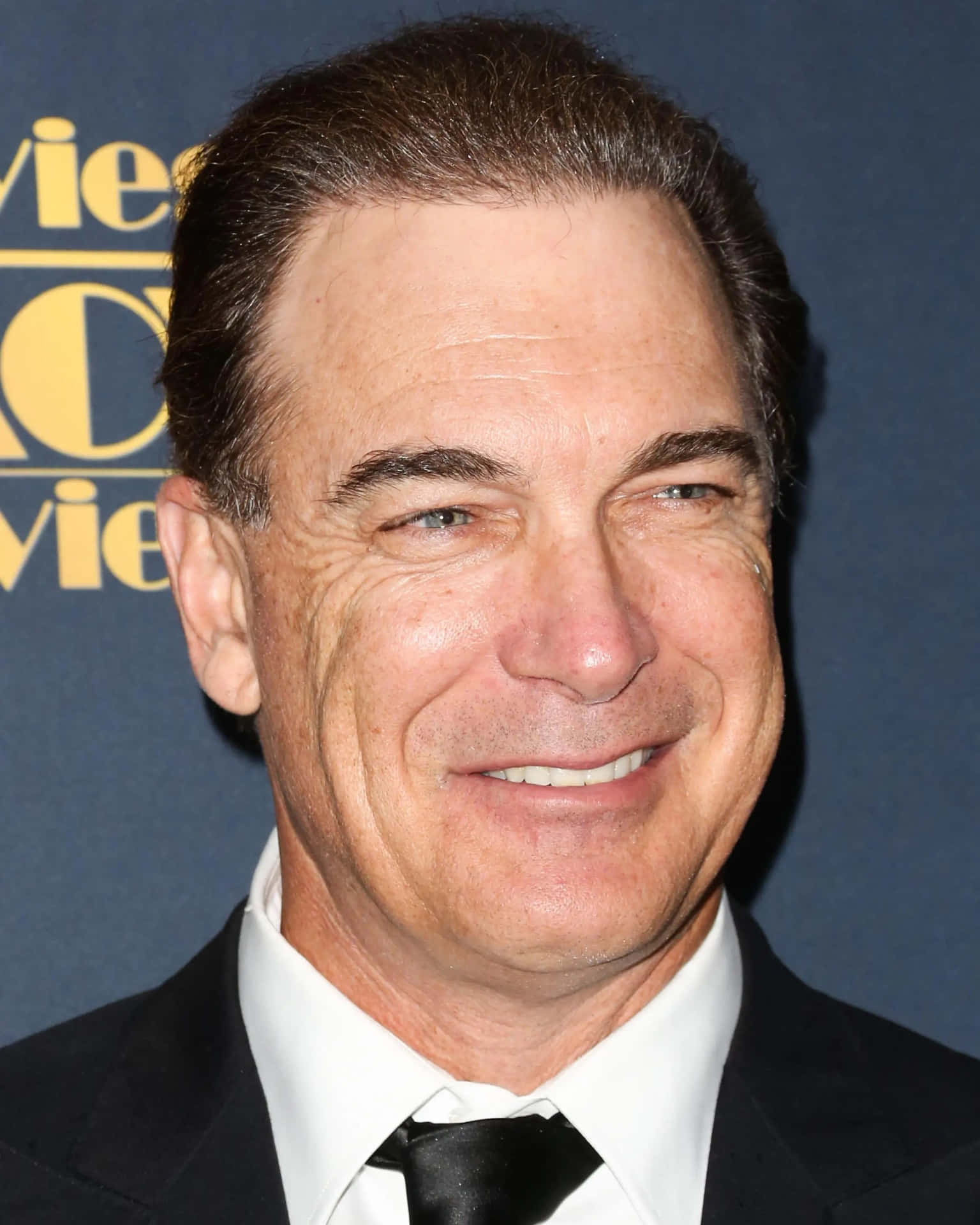 A Close-up Shot Of Actor, Patrick Warburton Background