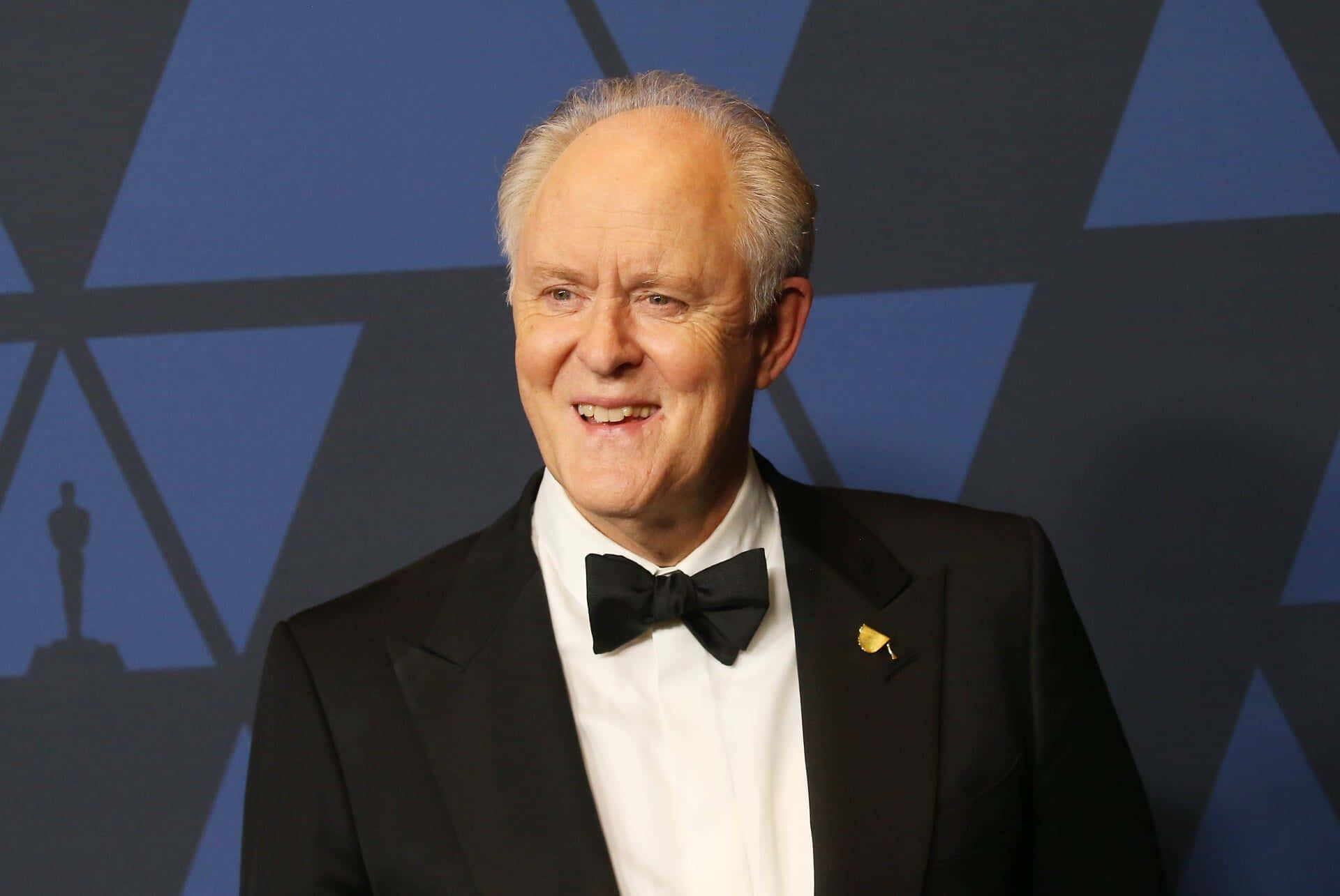 A Close-up Shot Of Iconic Actor John Lithgow Background
