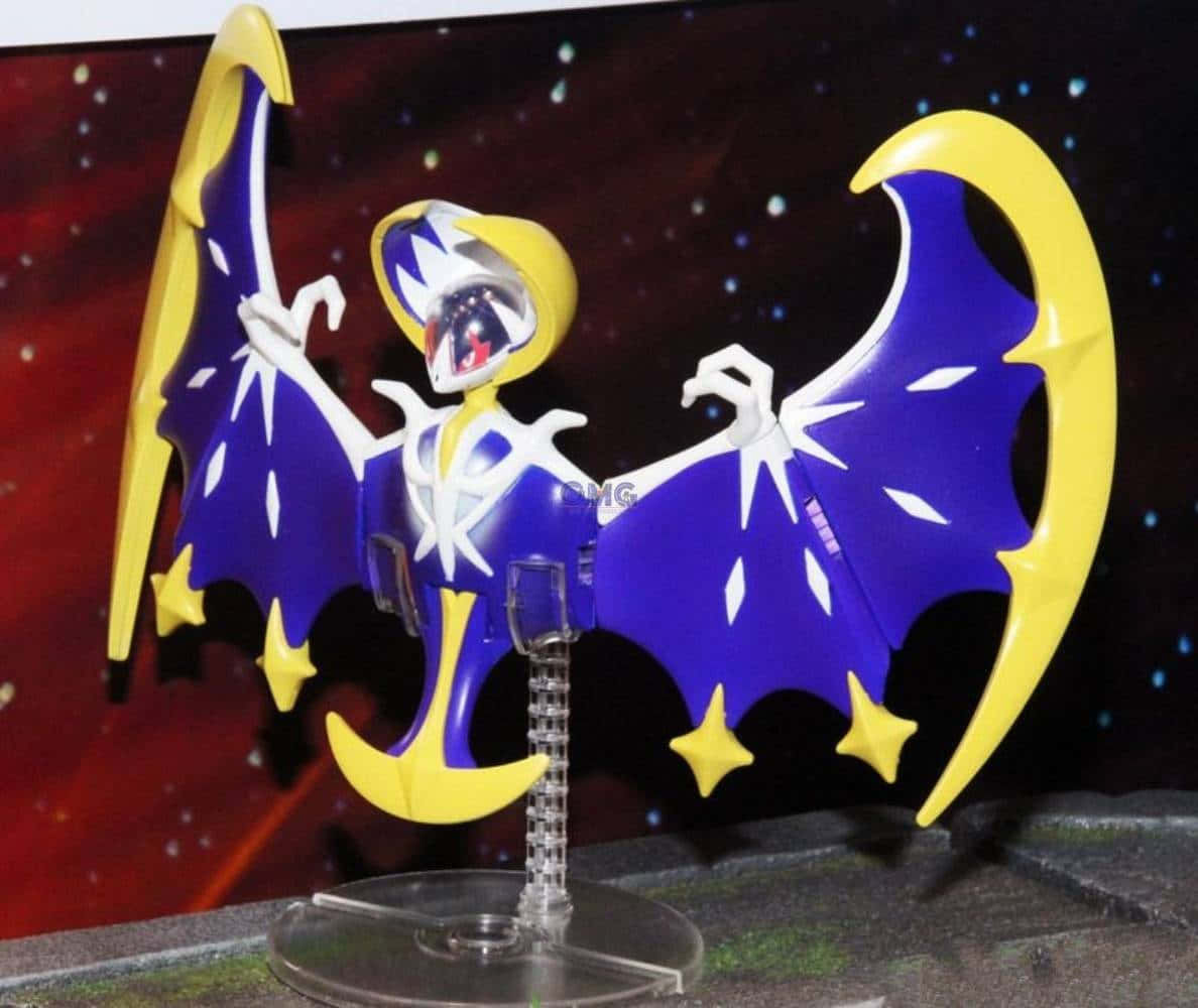 A Close-up View Of A Lunala Toy On Display Stand