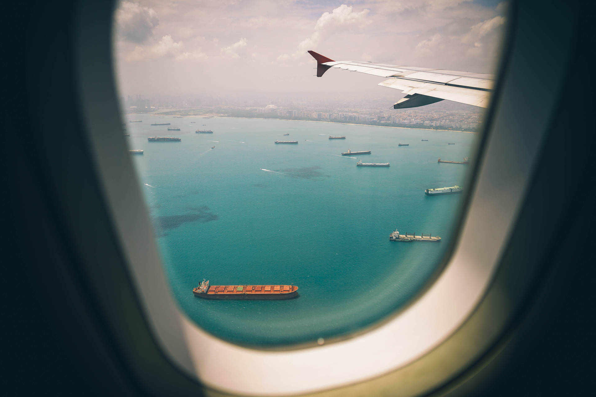 A Closer Ocean View From The Plane Window Background