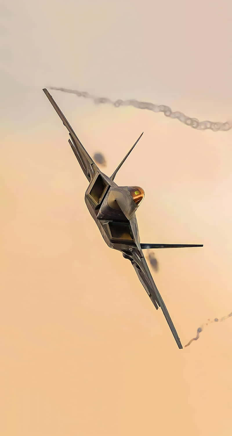 A Closeup Of An F-22 Raptor Jet In Flight Background