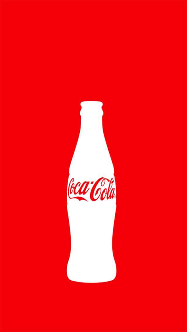 A Coca Cola Bottle On A Red Background Background