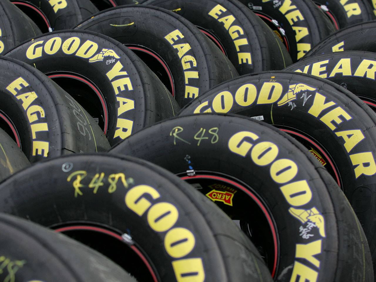 A Collection Of Goodyear Black Tires Background