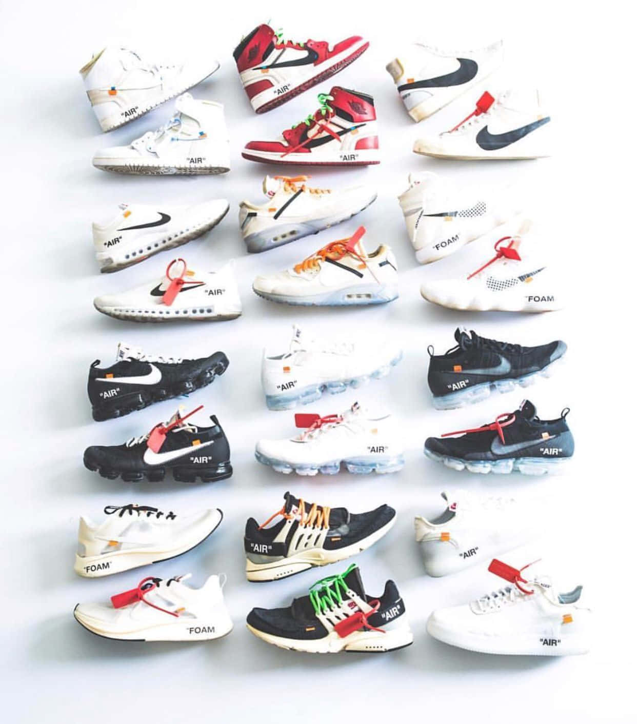 A Collection Of Nike Air Max Sneakers Are Arranged On A White Surface Background
