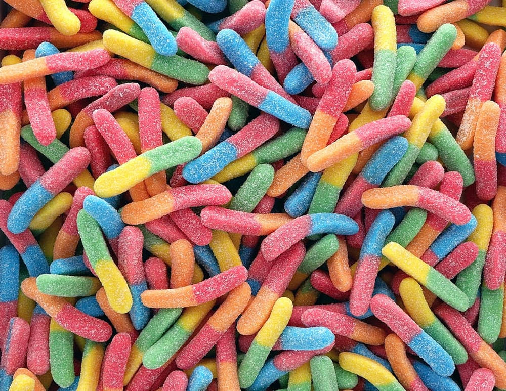 A Colorful Collection Of Sour Worm Sugar Candies