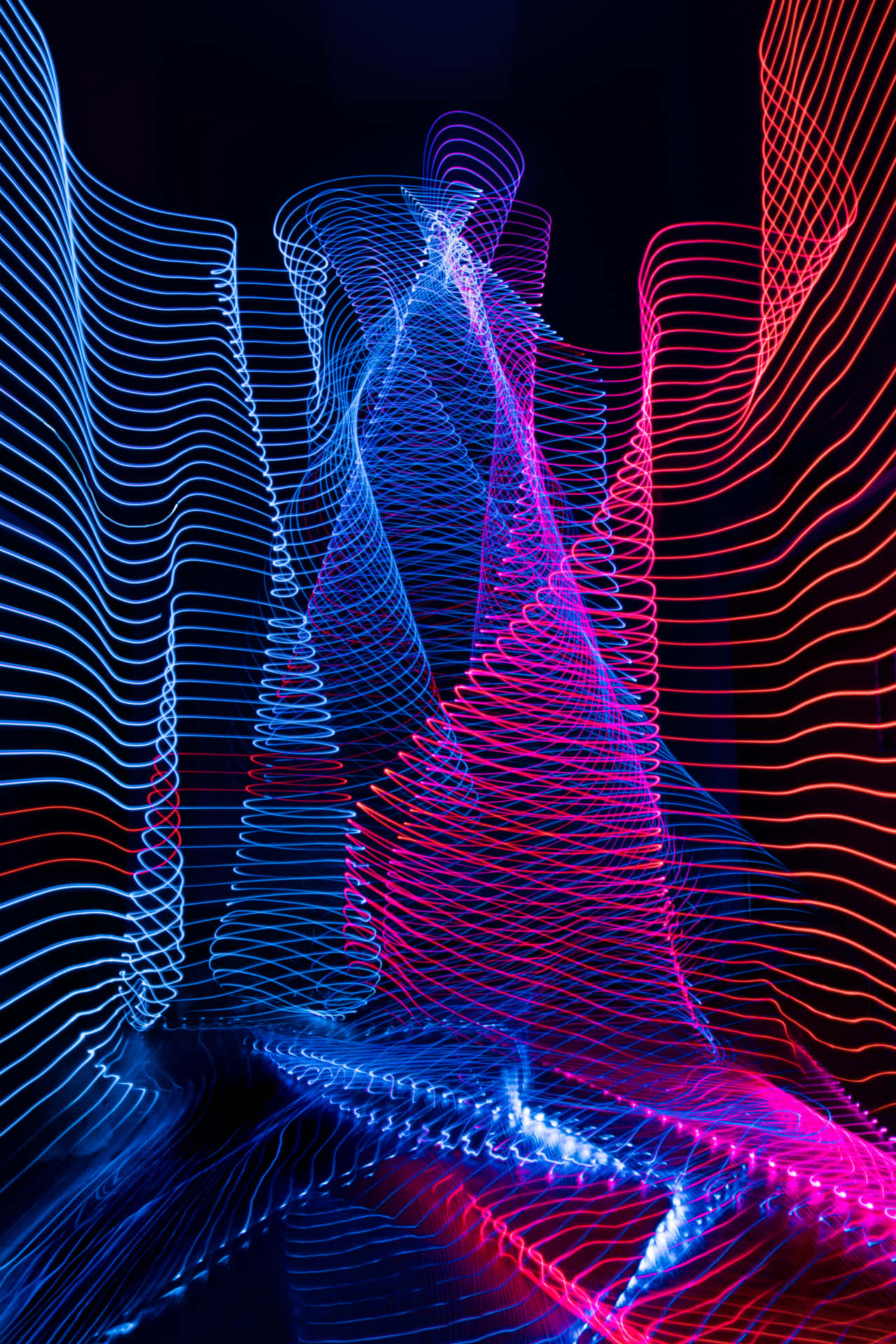 A Colorful Light Art Image With A Dark Background
