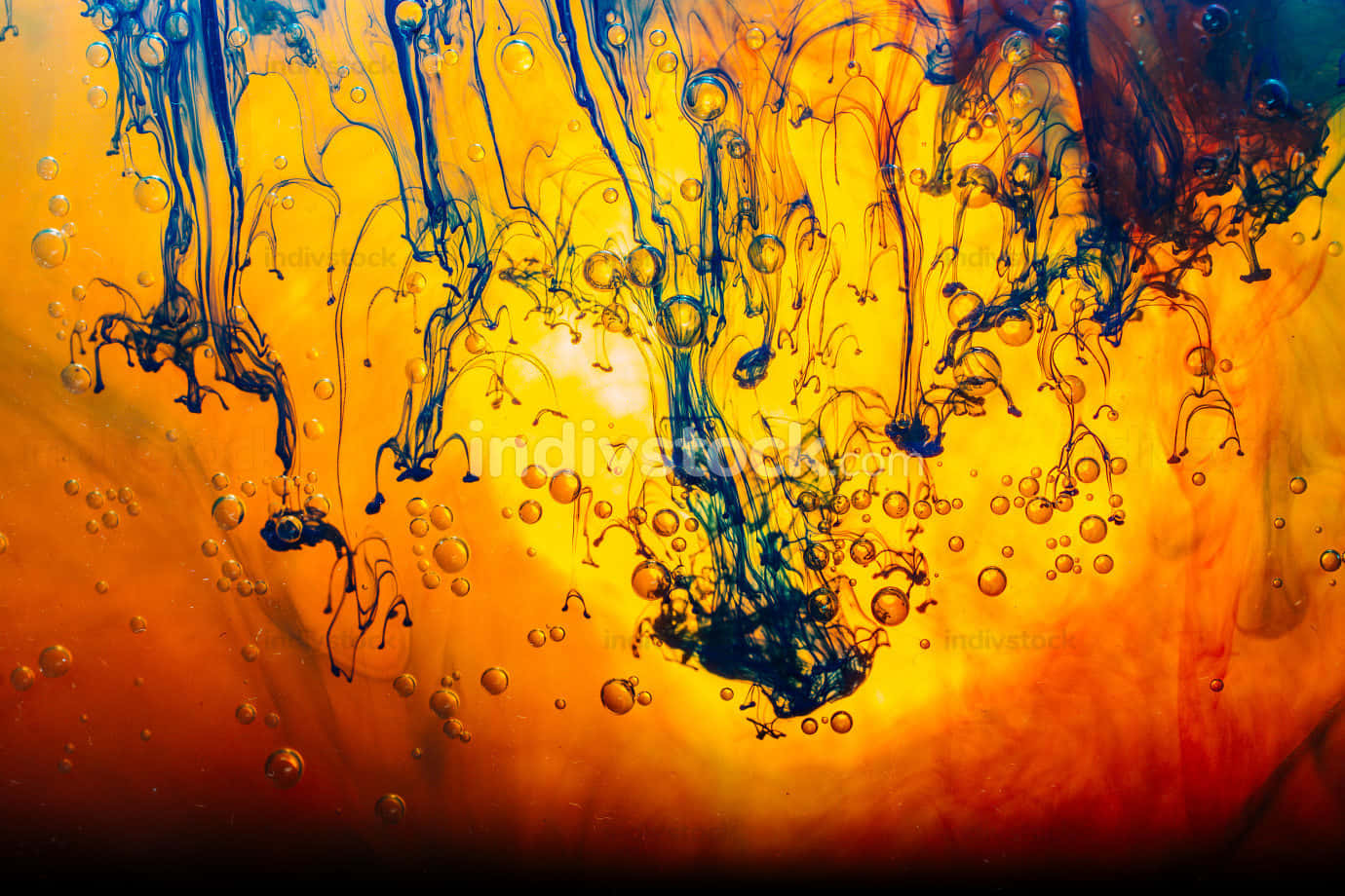 A Colorful Liquid With Orange And Blue Splashes Background
