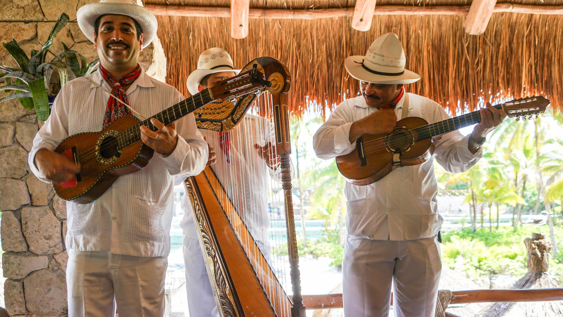 A Colorful Performance By A Traditional Mexican Man Background