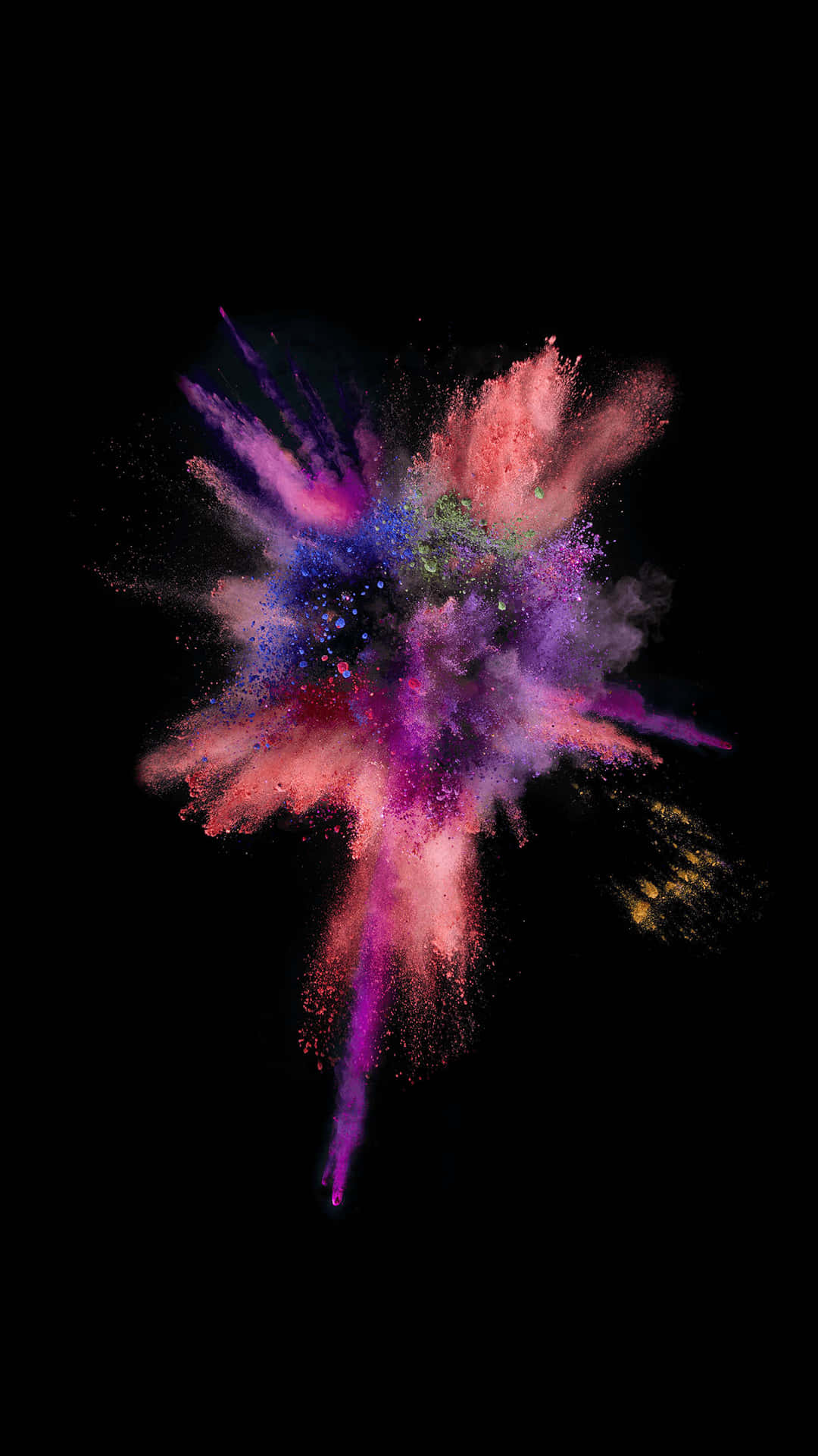 A Colorful Powder Explosion On A Black Background