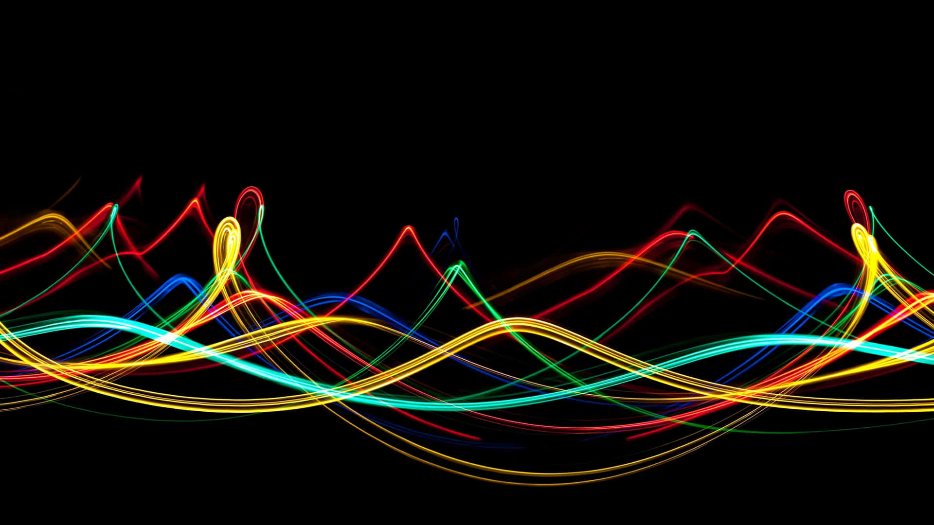 A Colorful Wave Of Light On A Black Background